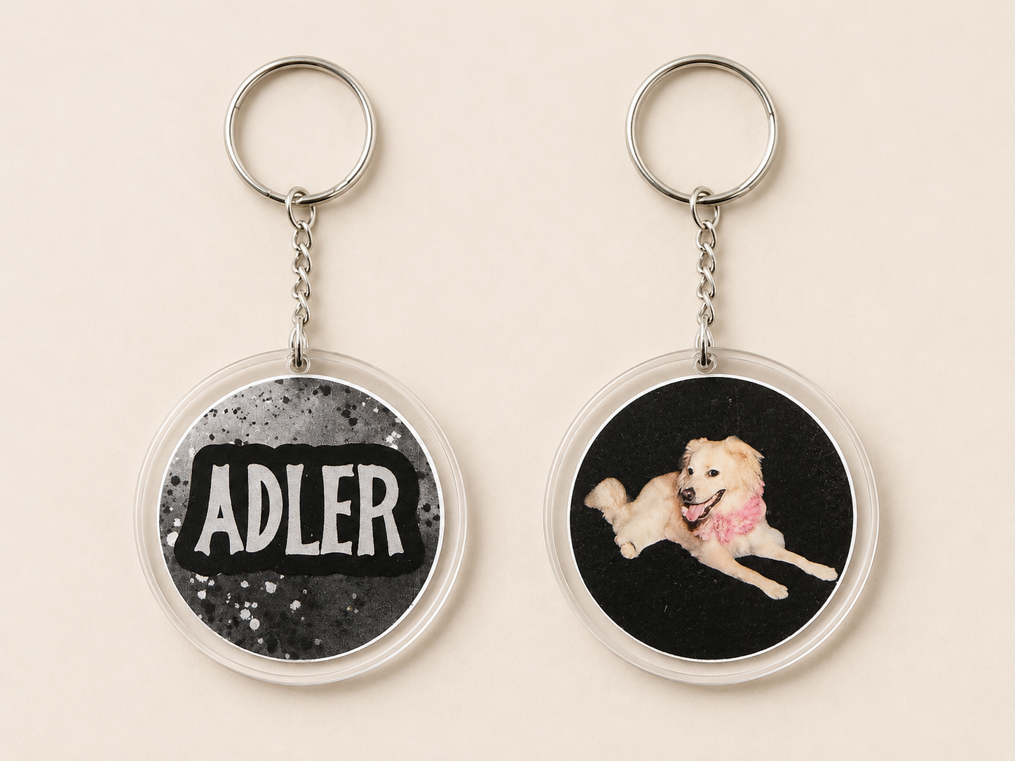 Clear acrylic keychain with Adler name on one side and dog portrait on the other