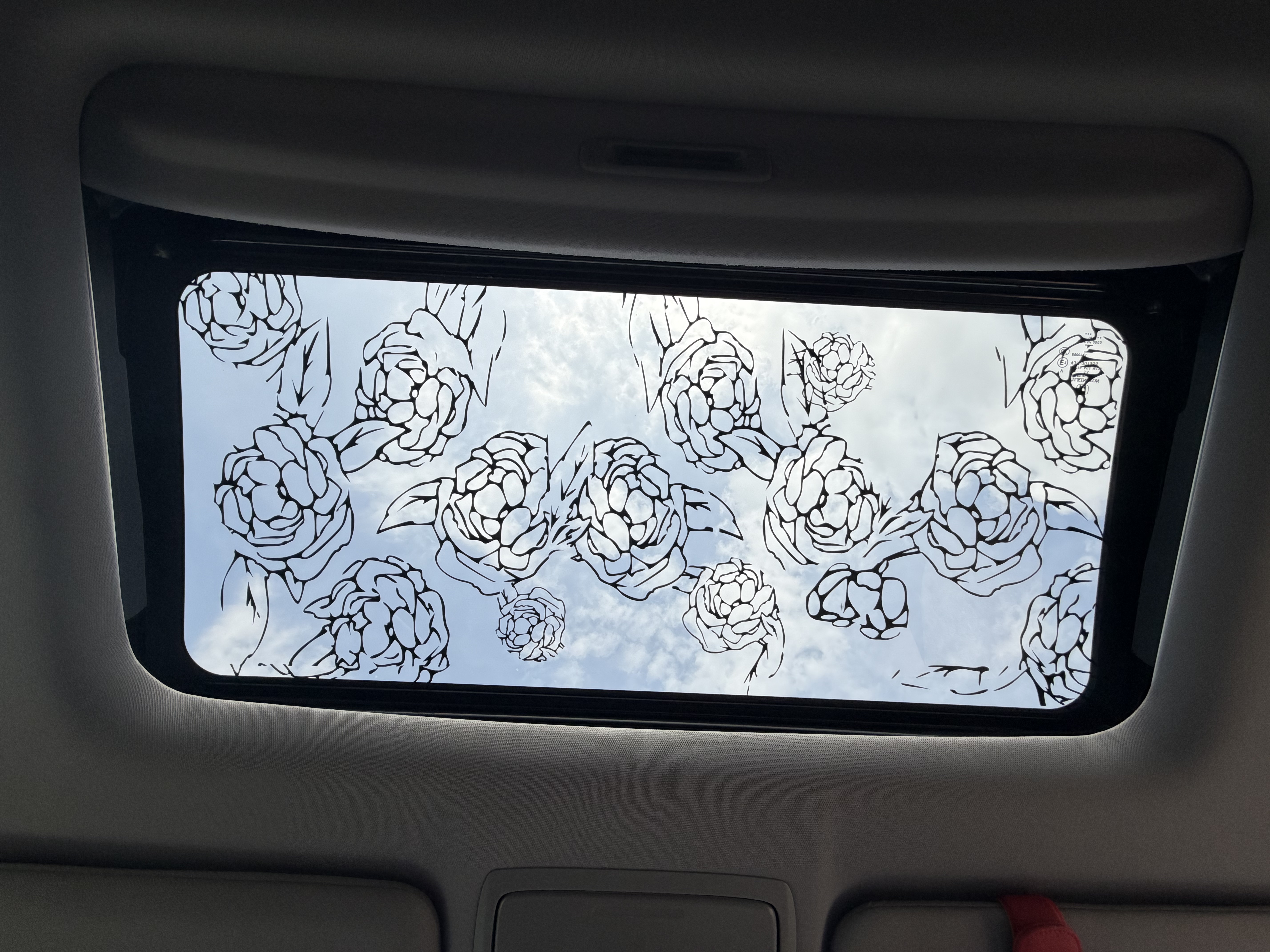 Floral peony vinyl decal on car sunroof