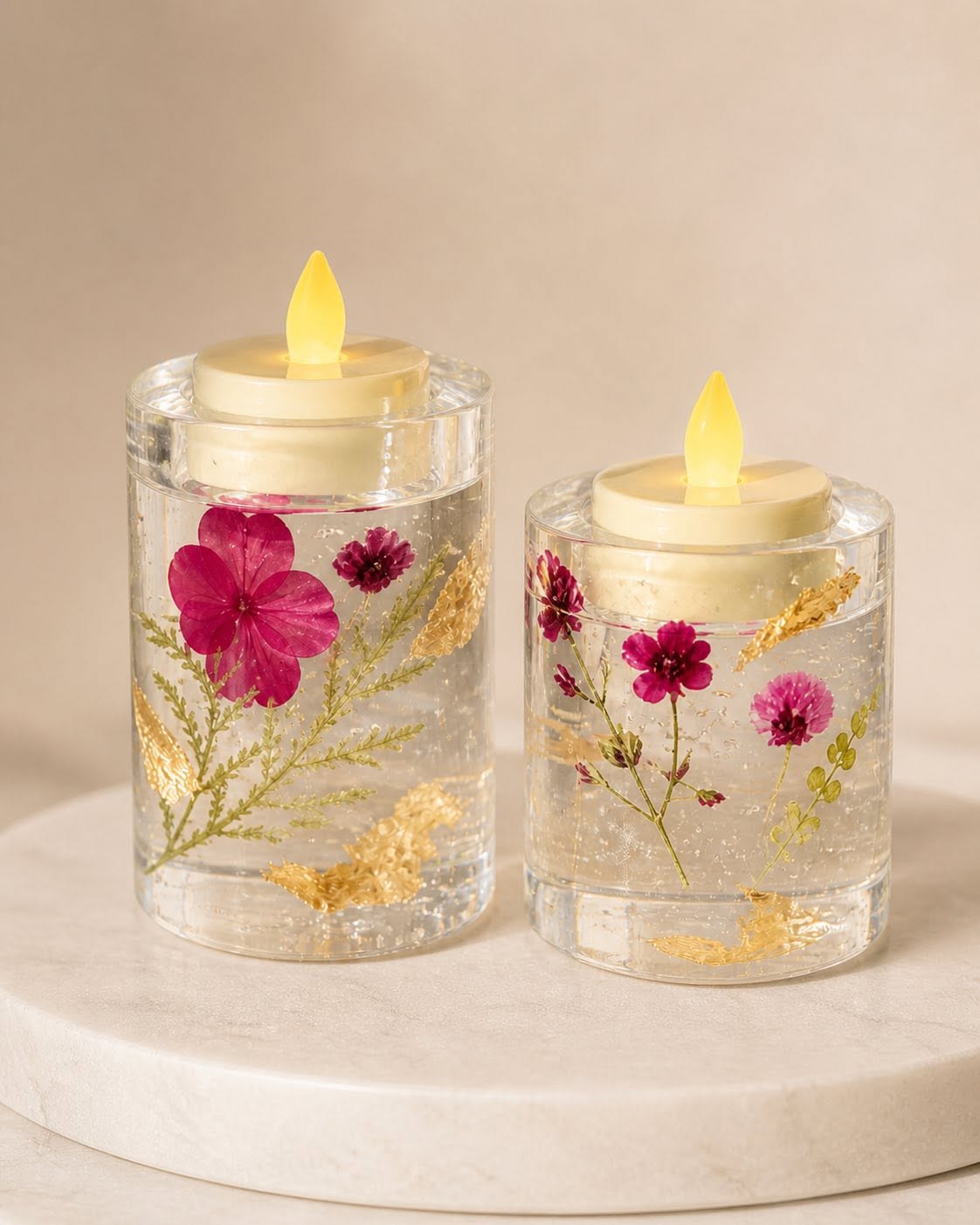 Pressed floral resin candle holders with magenta blooms