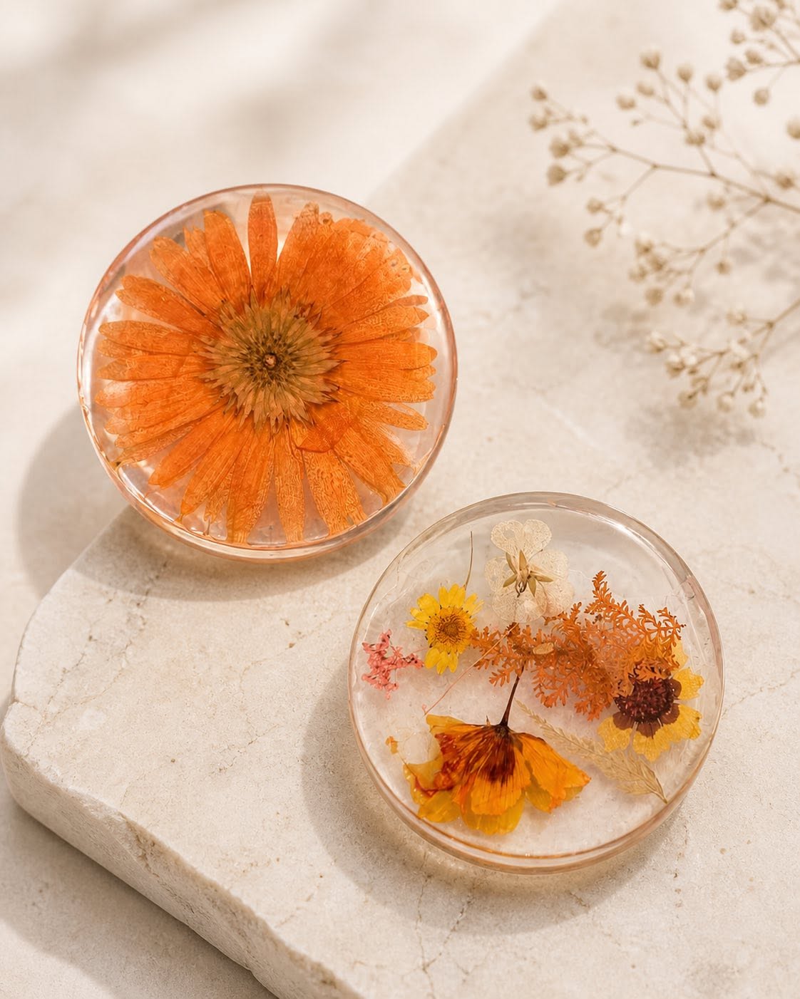 Pressed orange floral resin coasters pair