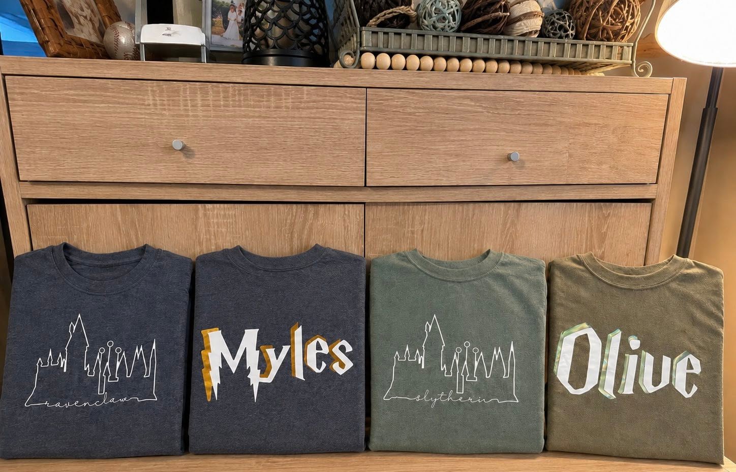 Custom Harry Potter–inspired name tee set — Ravenclaw, Myles, Slytherin, Olive