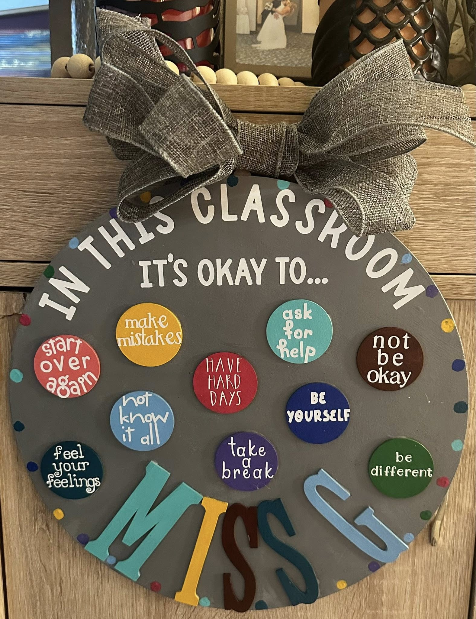 In This Classroom It's Okay round wood plaque