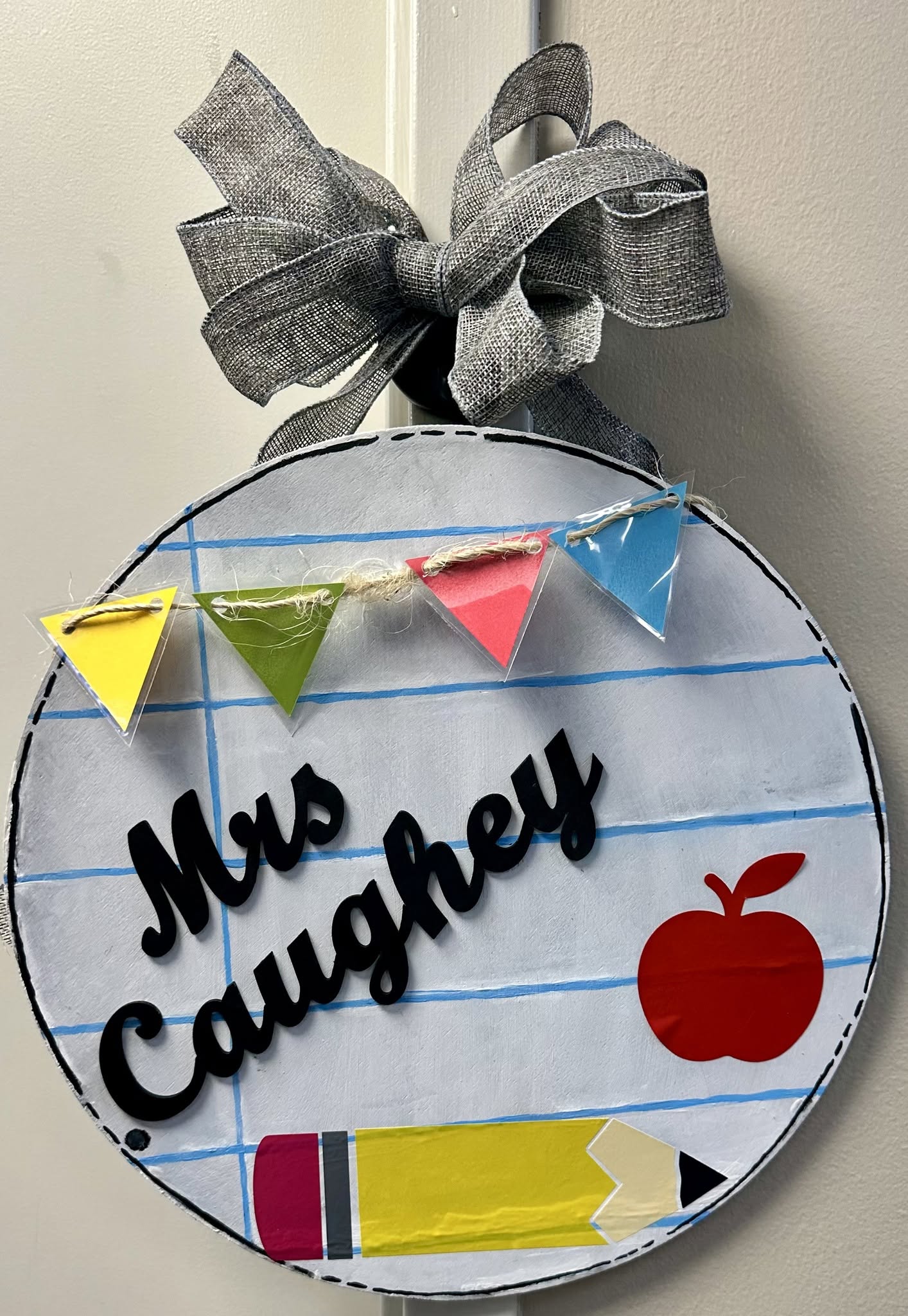 Mrs Caughey notebook paper classroom door sign