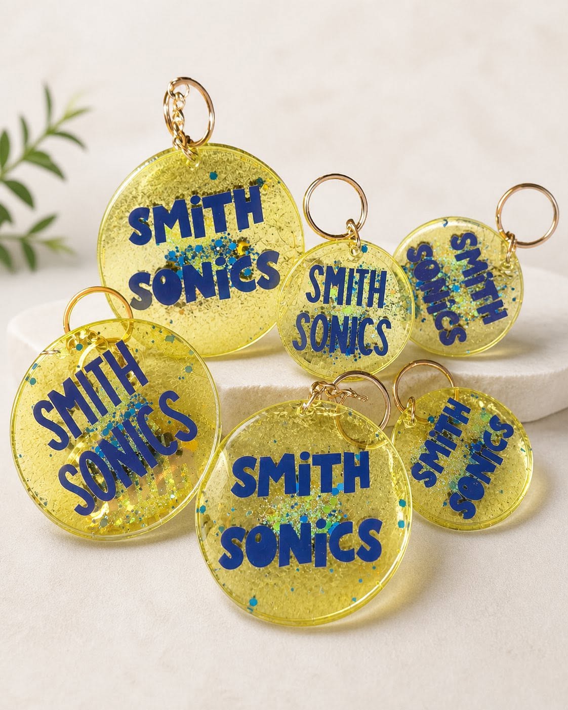 Smith Sonics yellow glitter resin keychains